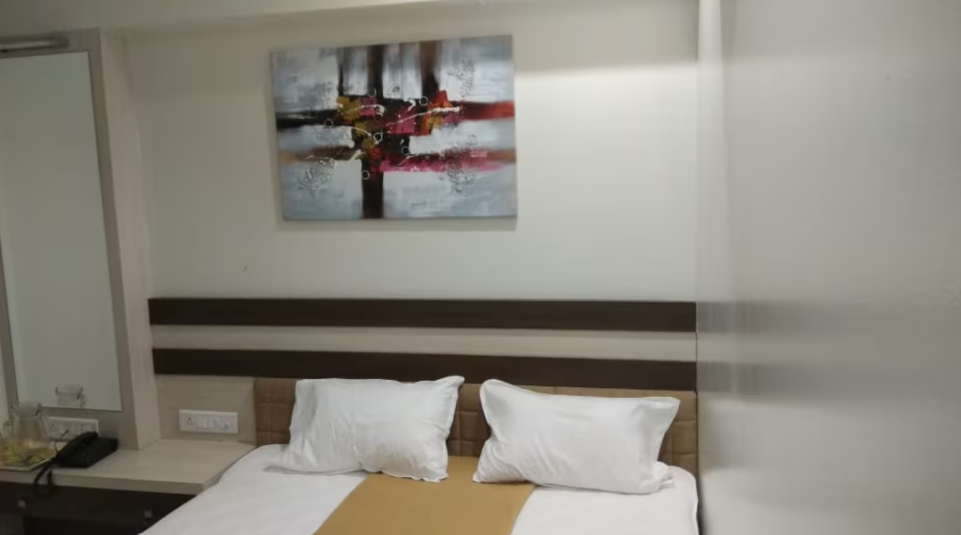 Hotel Rajlaxmi Grand Deluxe Room Non Ac 2