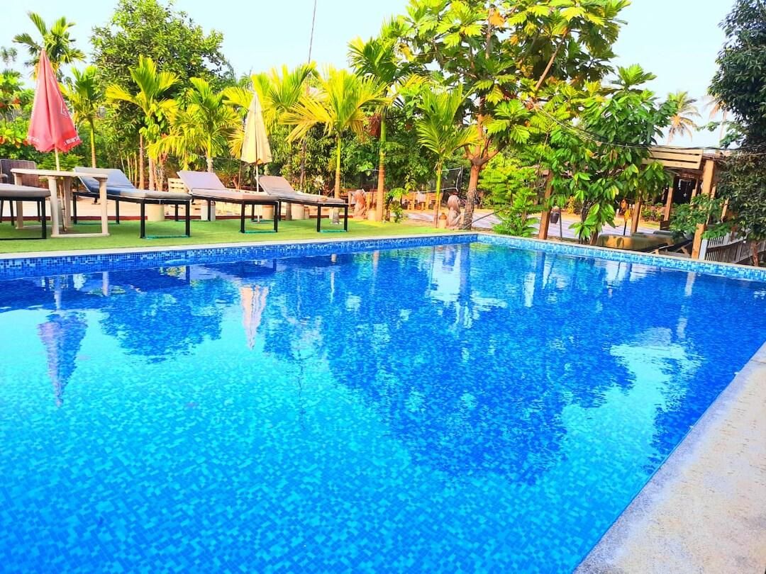 Go Green Spice & Eco Resort Wooden Cottage 6