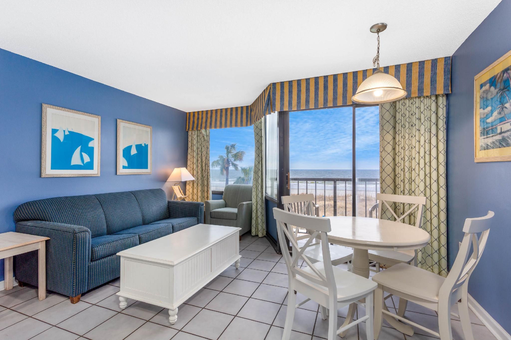 Ocean Club Resort Myrtle Beach a Ramada by Wyndham 1 Queen Bed, Suite, Side View, Non-Smoking 4