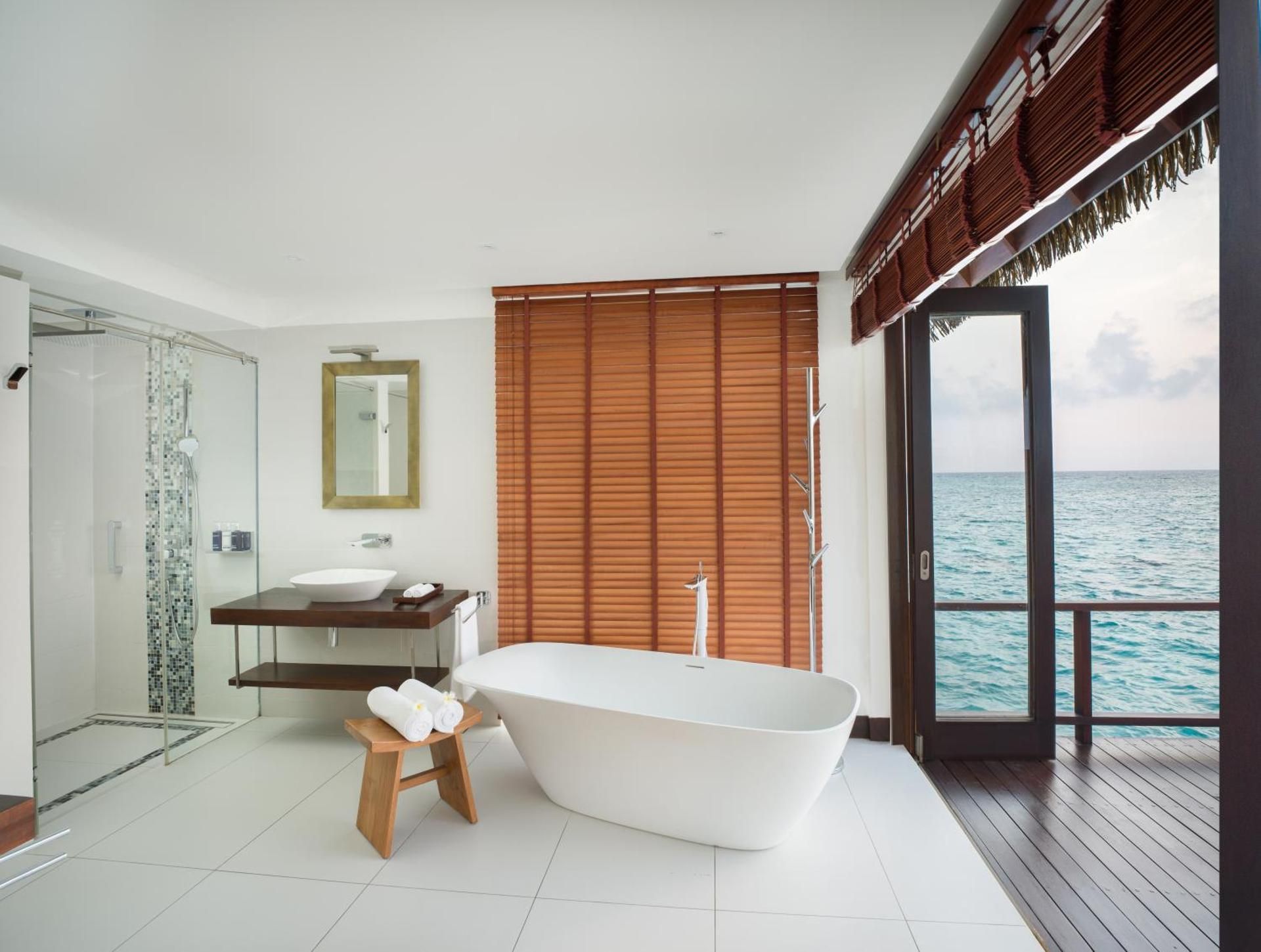 Ocean Suite with Infinity Pool - Personalized Butler Service Private Sea Plane Lounge Access Kids Club with Optional Nanny Services Maldivian Traditional Village Experience Access to 6 Exceptional Dine-Around Outlets