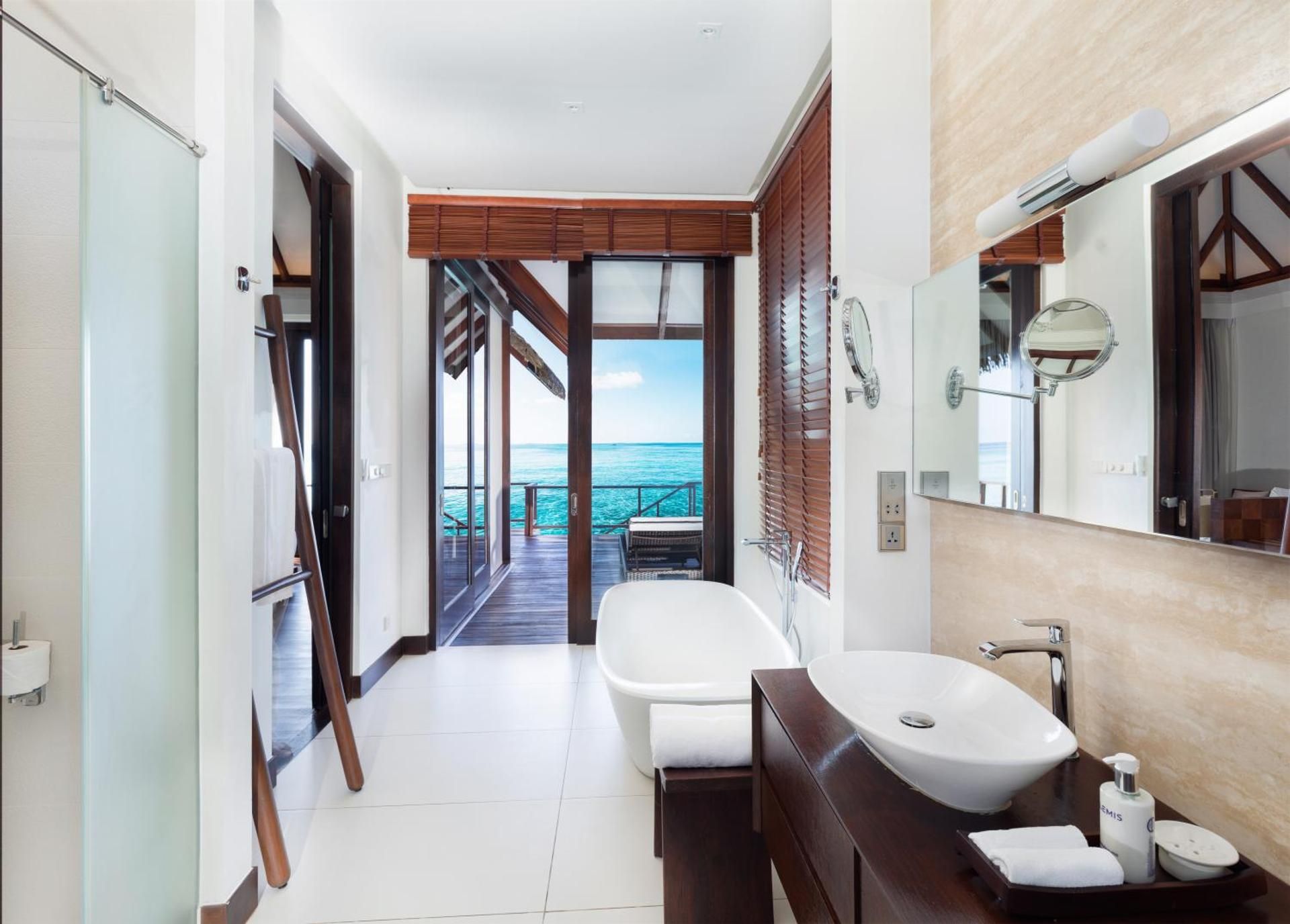 Ocean Villas - Personalized Butler Service Private Sea Plane Lounge Access Kids Club with Optional Nanny Services Maldivian Traditional Village Experience Access to 5 Exceptional Dine-Around Outlets