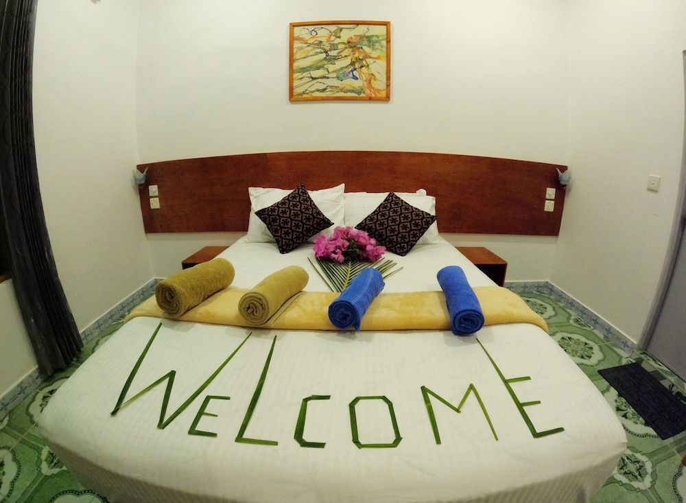 Adroit Beach Inn Deluxe Double Room, Garden View 3