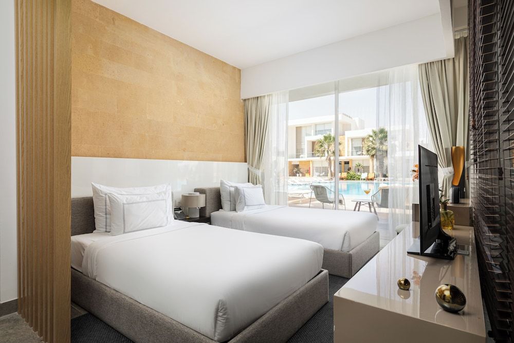 The G Hotel Seashell Pool Room Twin Bed 2