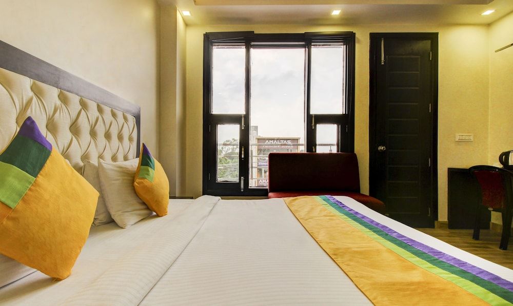 Treebo Trend Surya Residency Deluxe Room 5