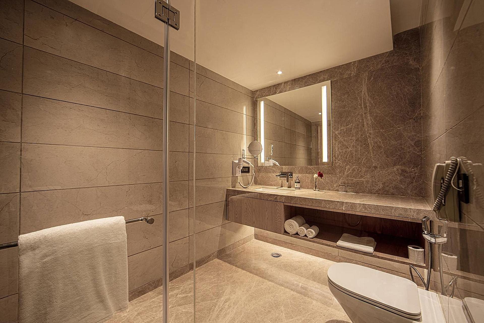 The Gaurs Sarovar Portico Deluxe Room - 2 Single Beds 31SQM Free WiFi 4