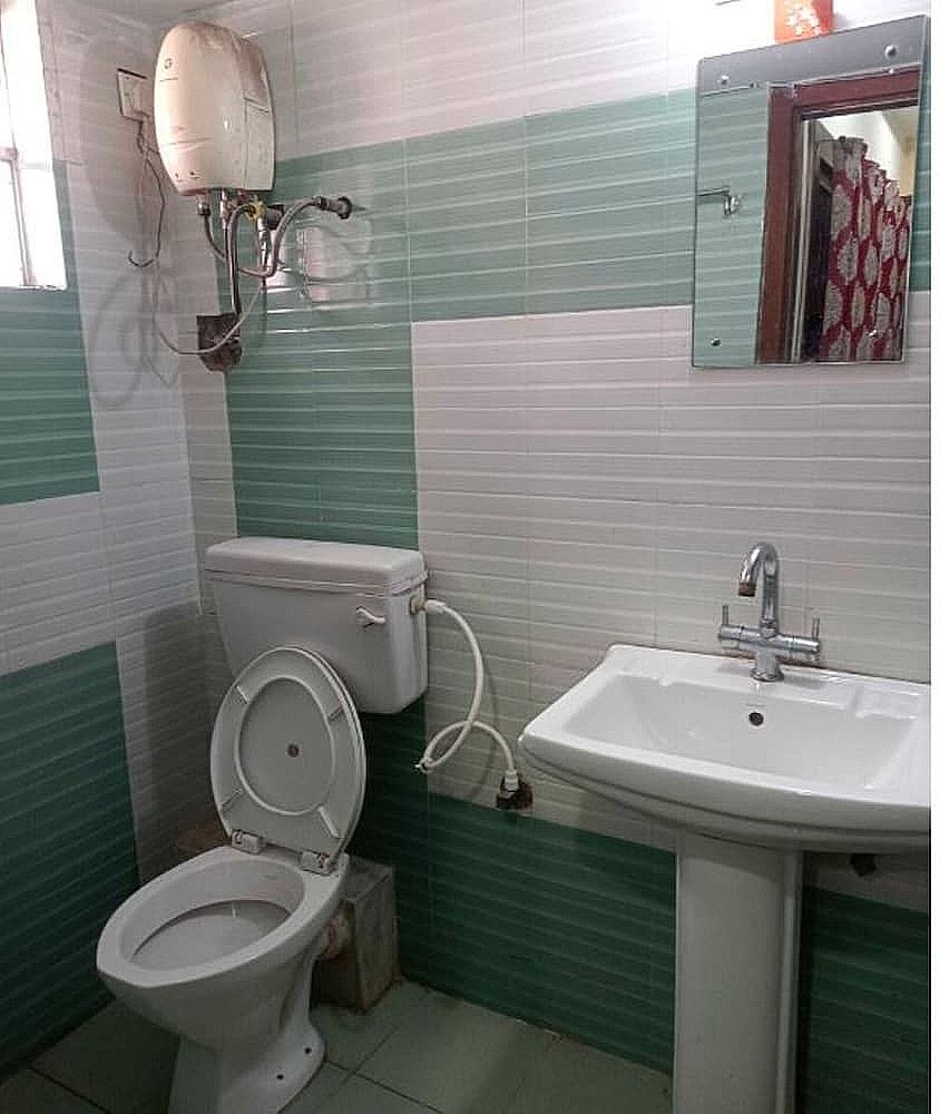 Goroomgo Puja Residency Kolkata Deluxe Double Room, City View 8