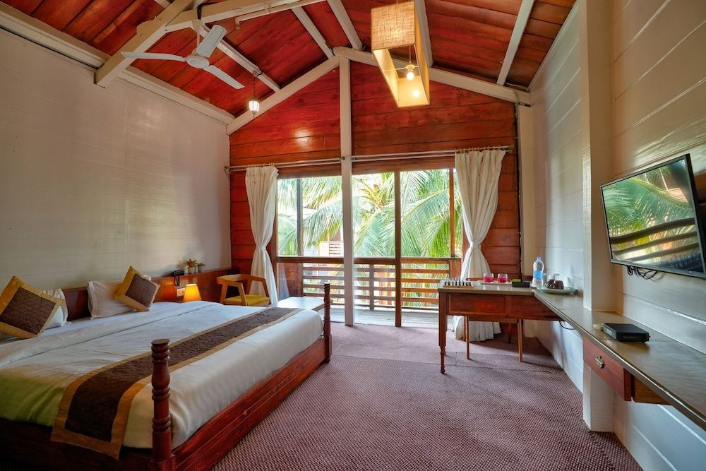 Aqua Marina Beach Cottages Deluxe Cottage with Pool View 4