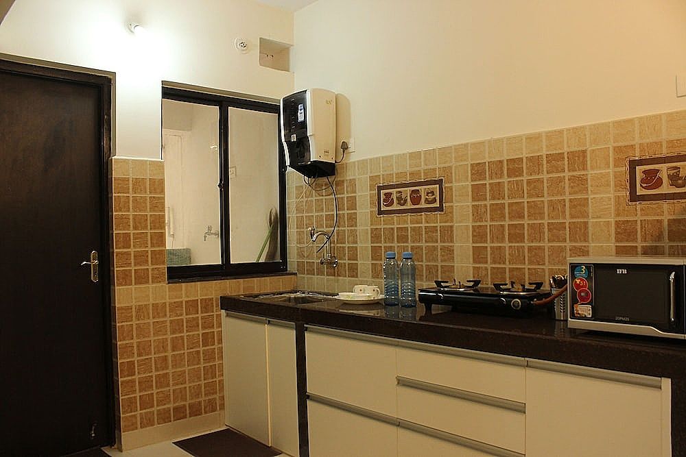 OYO 9364 Home Modern 2 BHK Pool View Candolim Double or Twin Room 12