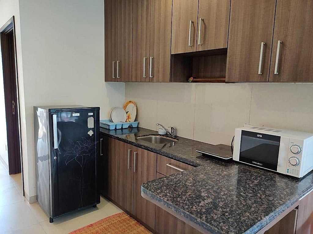 Aarju Luxurious Wave 1BHK Apartment with Pool View  10