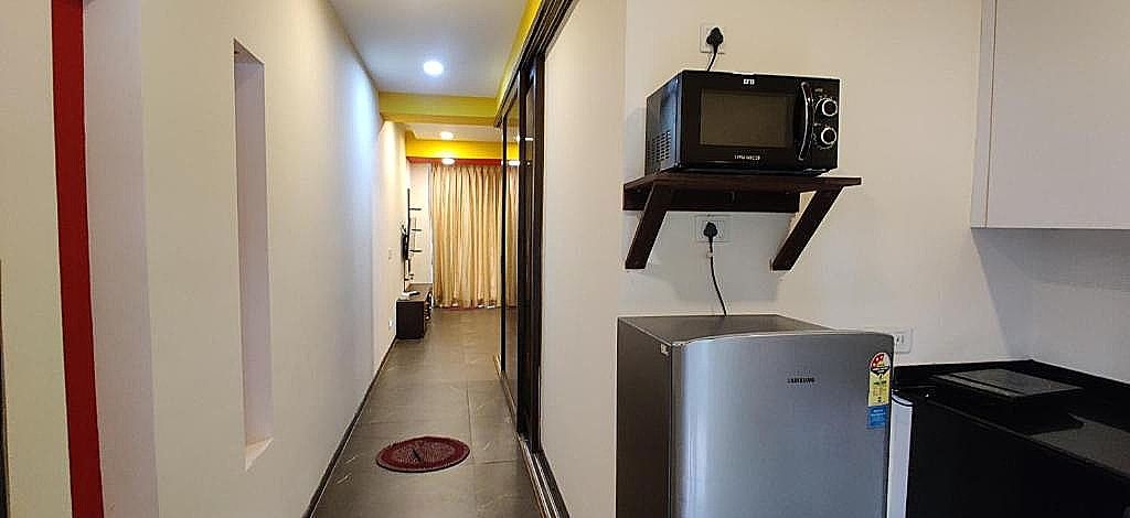 Aarju Luxurious Wave 1BHK Apartment with Pool View  38