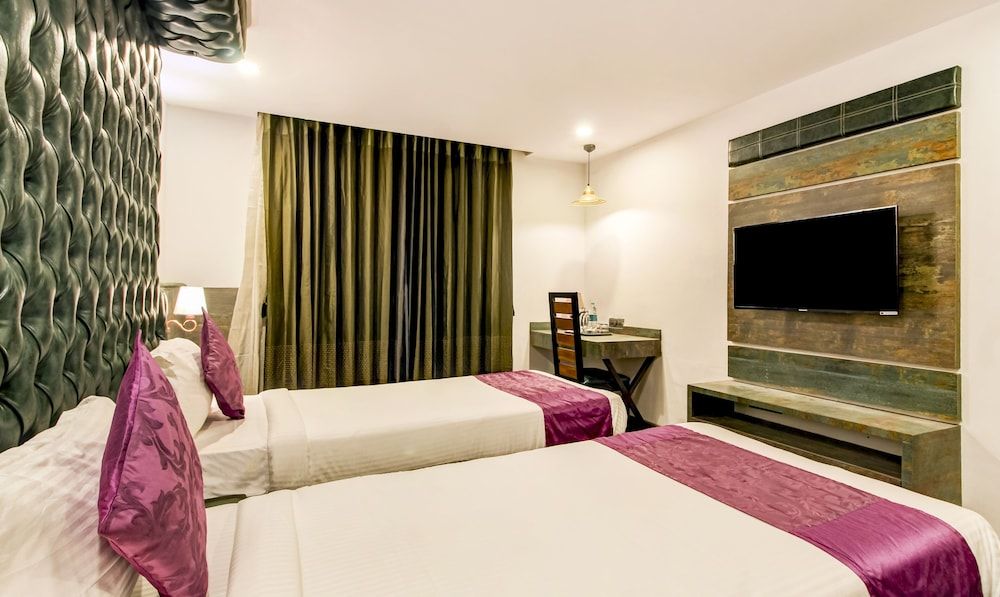 Treebo Tryst F One Deluxe Room 10