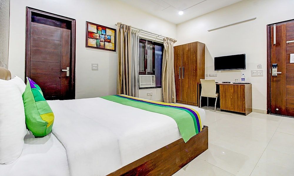 Treebo M2M Residency Sector 46 Deluxe Double Room 7