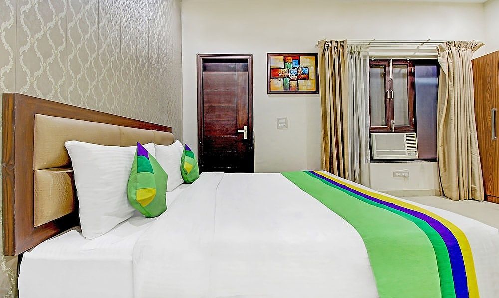 Treebo M2M Residency Sector 46 Deluxe Double Room 9