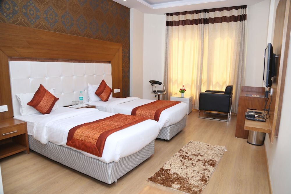Qcent Gurgaon by Pacific Inn Deluxe Double or Twin Room, 1 King Bed, Non Smoking, City View 5
