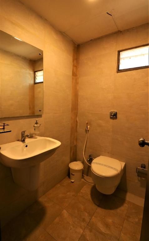 Goverdhan Greens Resort Super Deluxe Room with Balcony 4