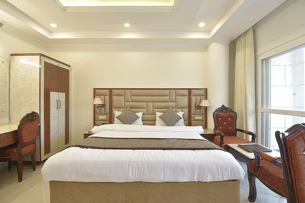 Royal Castle Dharamshala Deluxe without balcony 9