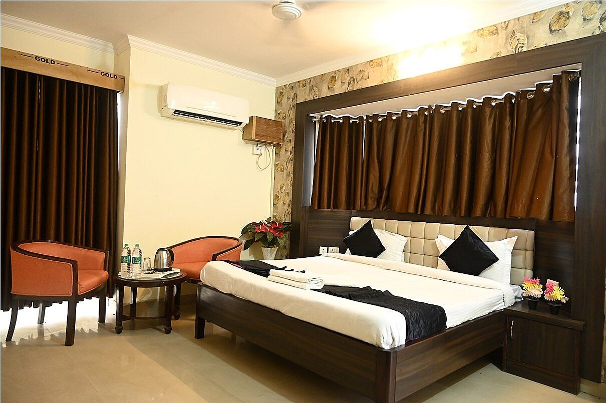 Ganga Darshnam Guest House Deluxe Room