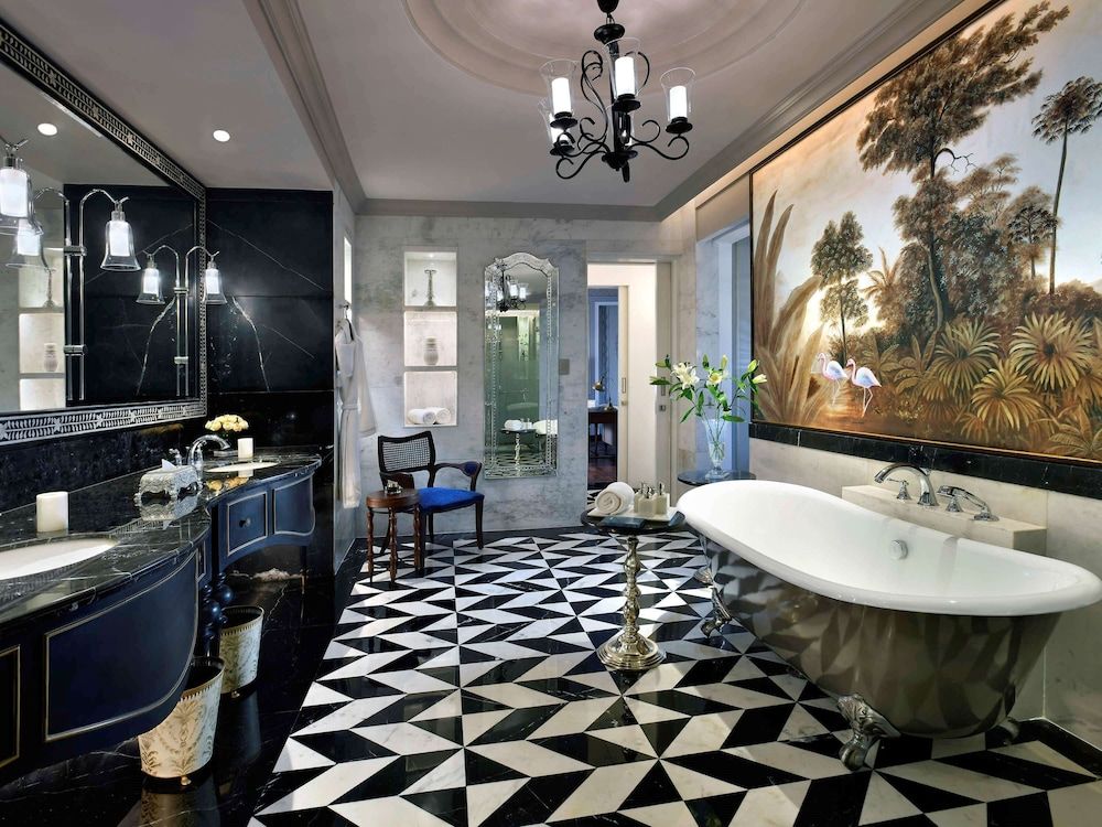 Raffles Udaipur Lakeshore Signature Room- 60 sqm retreat on lake shore with views, tub, rain shower, and decor 4