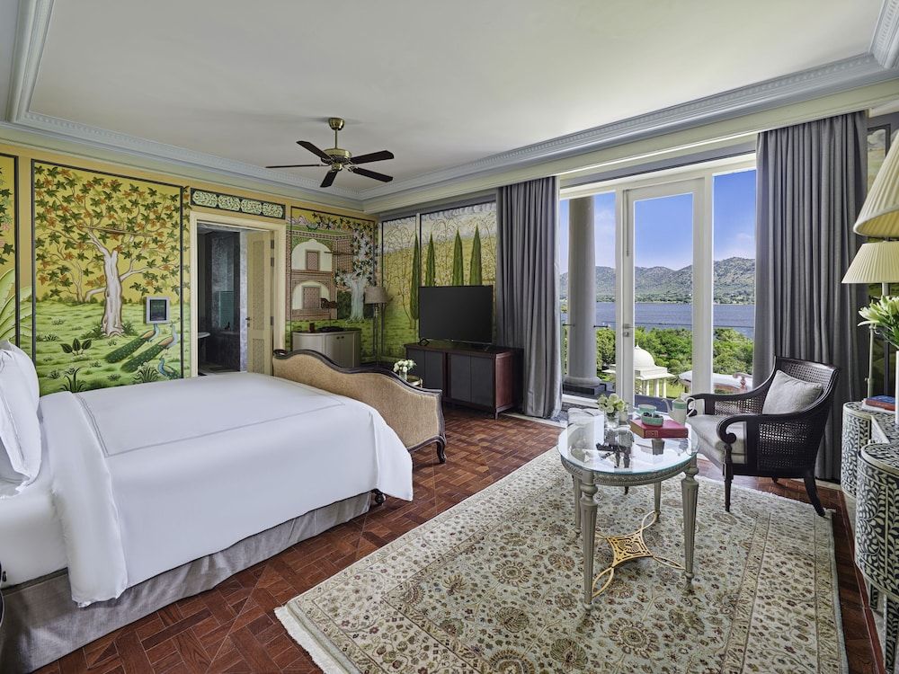 Raffles Udaipur Lakeshore Signature Room- 60 sqm retreat on lake shore with views, tub, rain shower, and decor 3