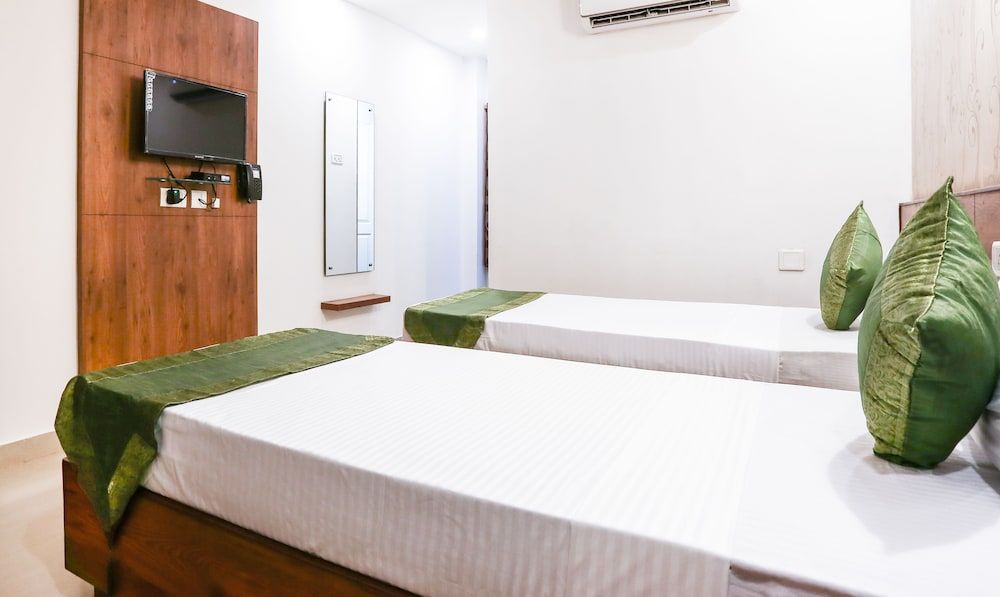 Treebo Comforts Inn, University Road Deralakatte Standard Double Room 10