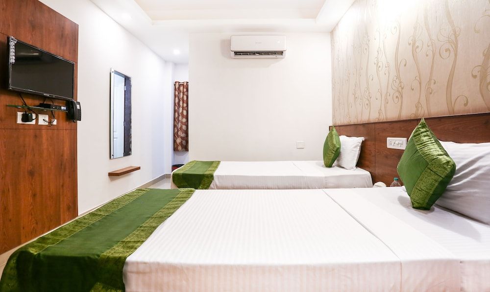 Treebo Comforts Inn, University Road Deralakatte Standard Double Room 6