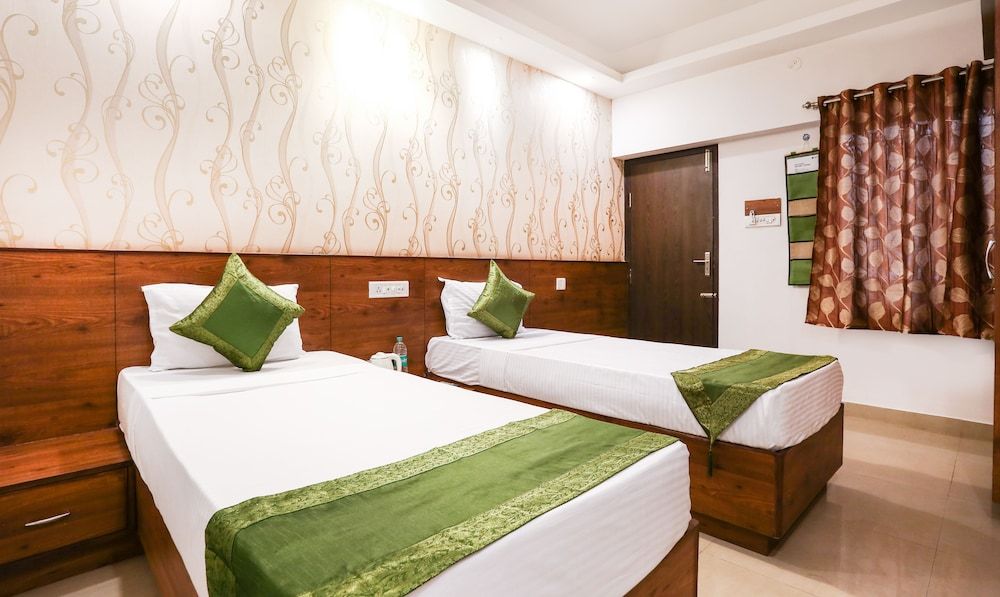 Treebo Comforts Inn, University Road Deralakatte Standard Double Room 7