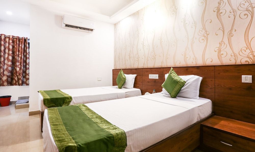 Treebo Comforts Inn, University Road Deralakatte Standard Double Room 8