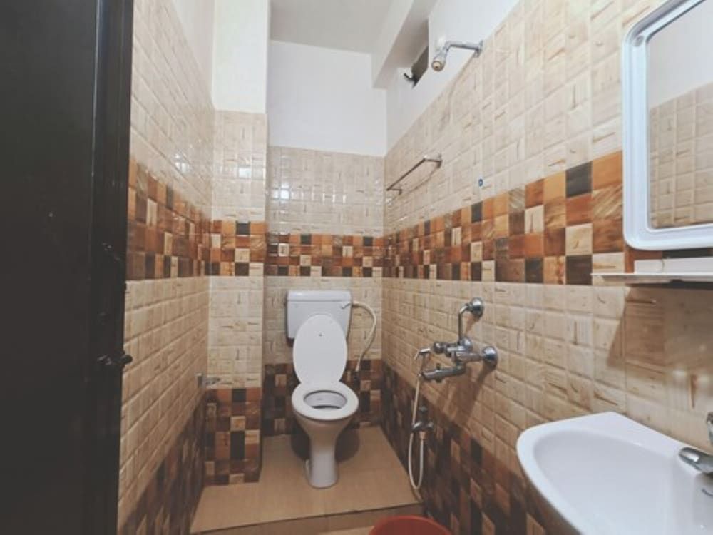 Goroomgo Krishna Residency Puri Deluxe Double Room, City View 18