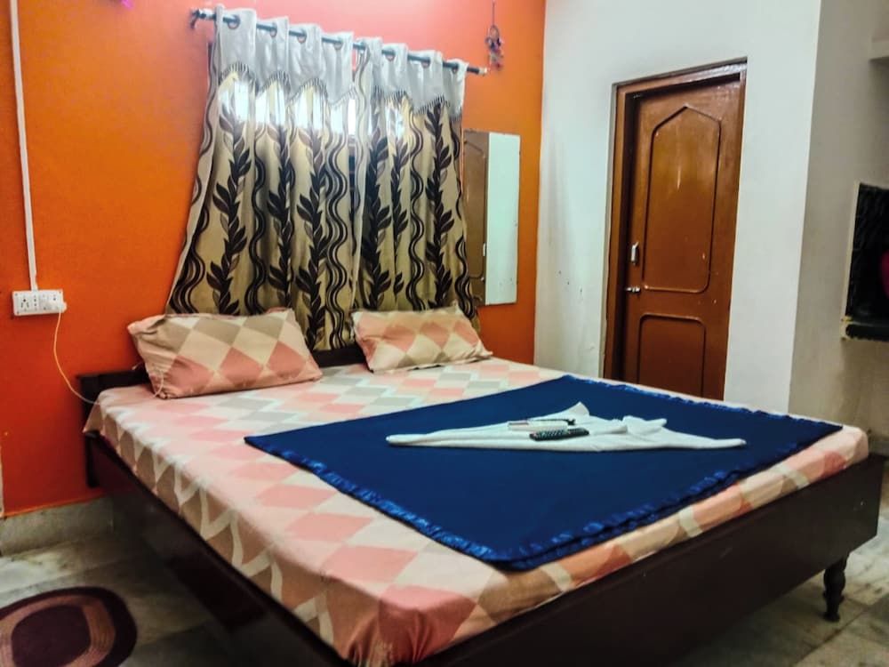 Goroomgo Rukmini Villa Puri Deluxe Double Room, Balcony 7