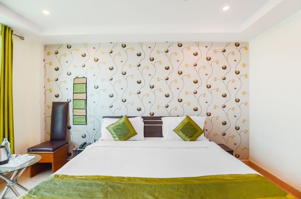 Treebo Graphixo Inn Standard Room