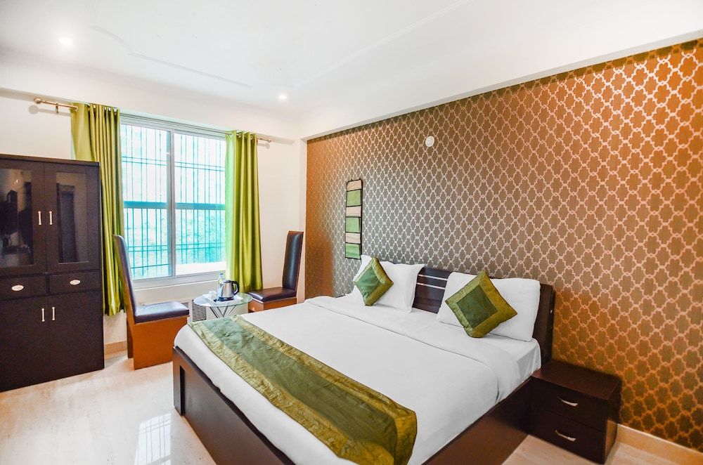 Treebo Graphixo Inn Standard Room 10