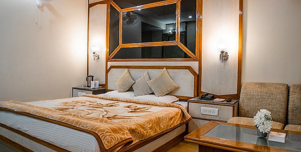 Sukhsagar Regency | Indoor heated pool Deluxe Room AC/Heating 5
