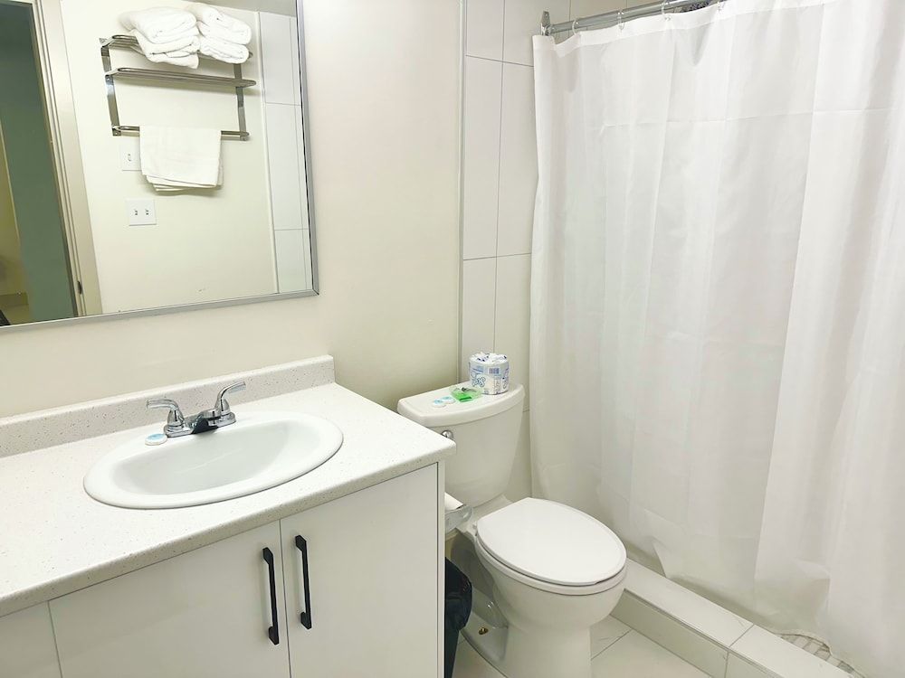 Canadian Inn Standard Suite, 1 Queen Bed with Sofa bed, Refrigerator & Microwave 2