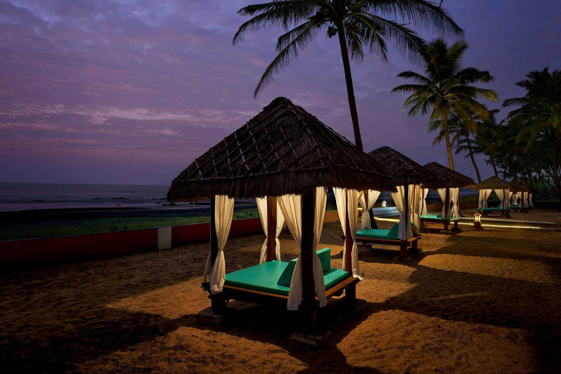 Facade - Nighttime - Beach Cabanas - Ocean