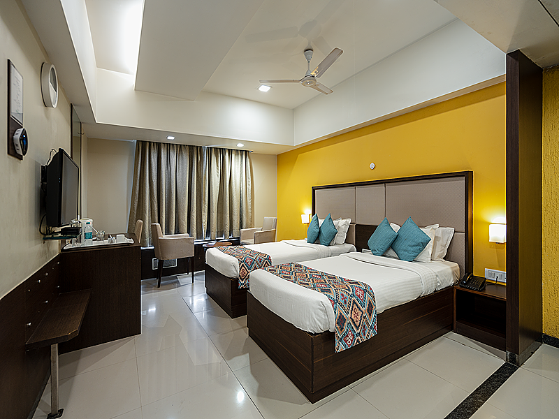 GCC Hotel And Club Deluxe Room Twin Bed 5