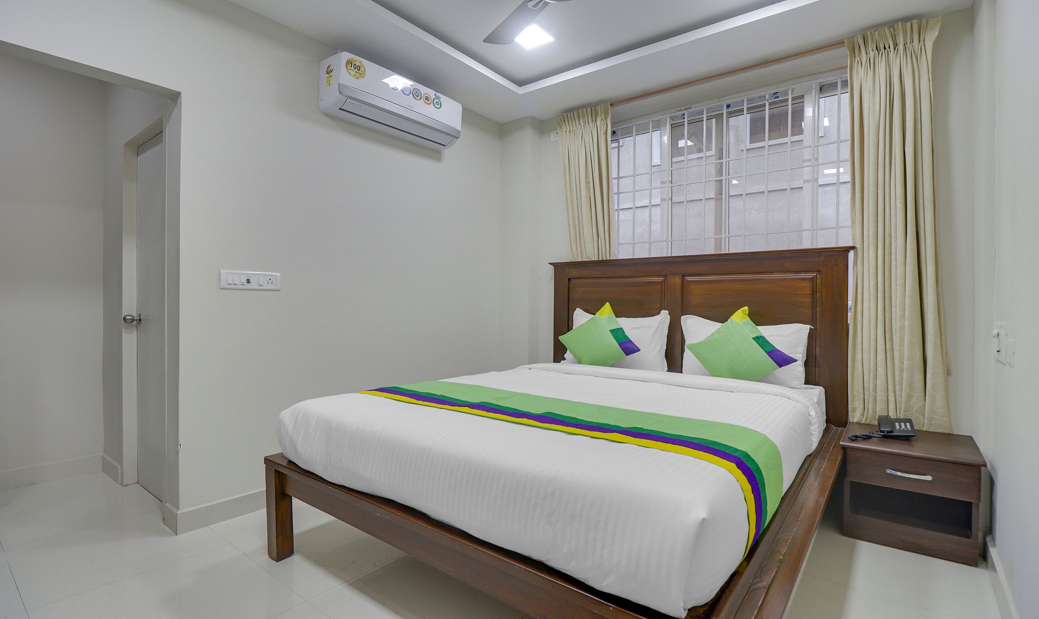 Rithikha Inn Crest Maple