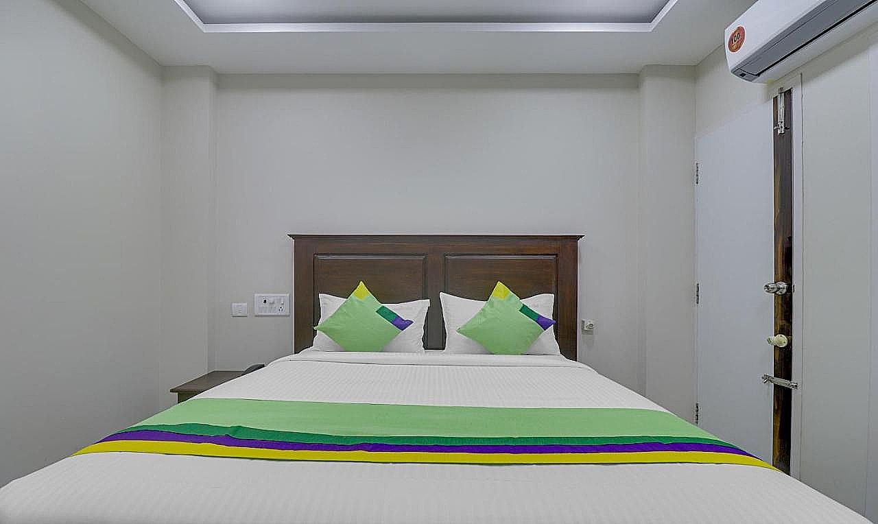 Rithikha Inn Crest Maple 4