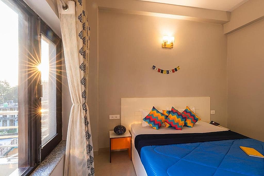 goSTOPS Rishikesh Lakshaman Jhula Deluxe Double AC Room with Ensuite Bathroorm