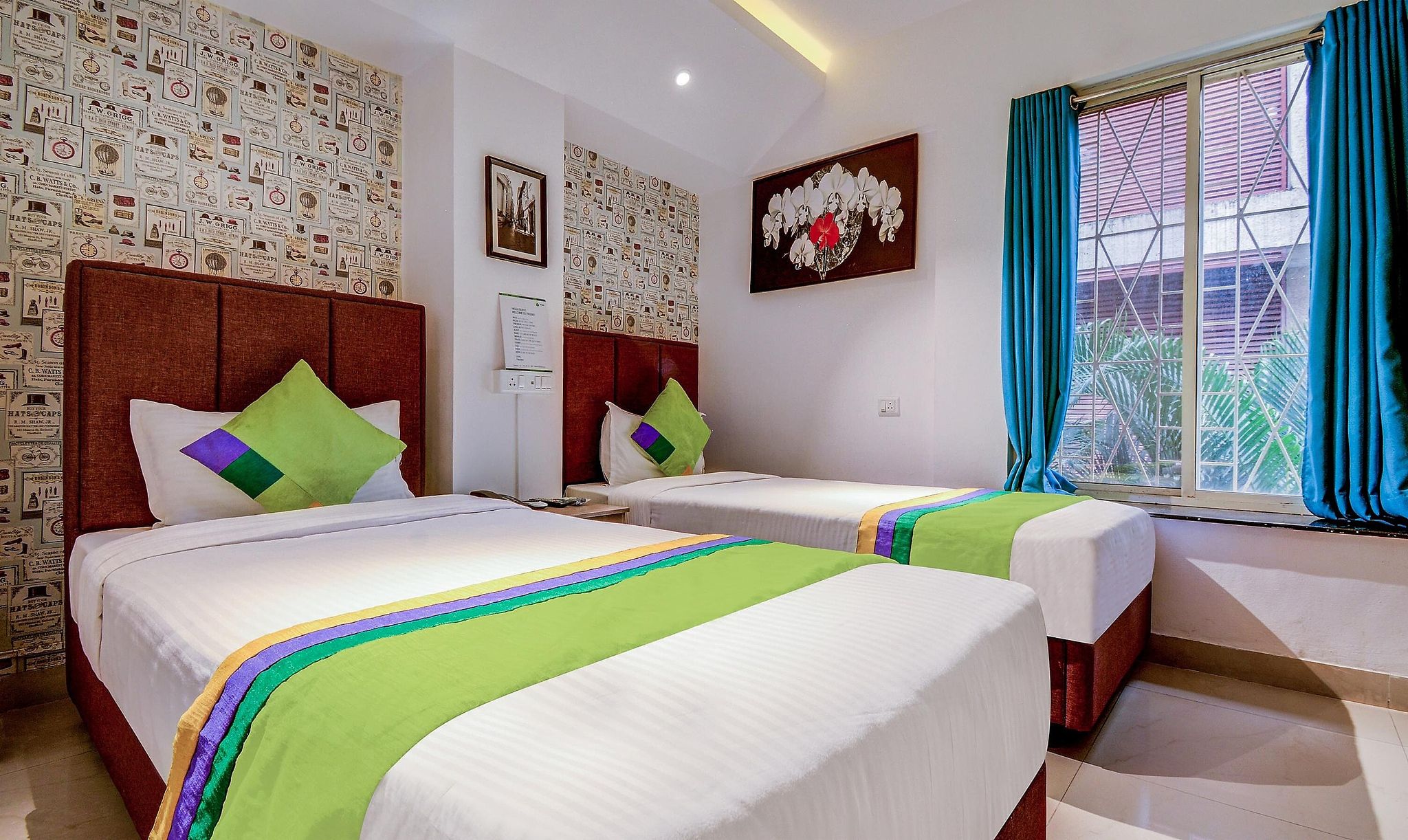 Treebo Iris Suites Standard Room With Twin Bed