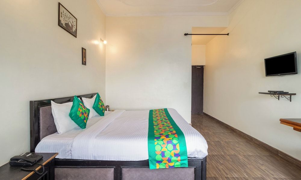 Treebo Spring Birds - Kainchi Dham Standard room with balcony