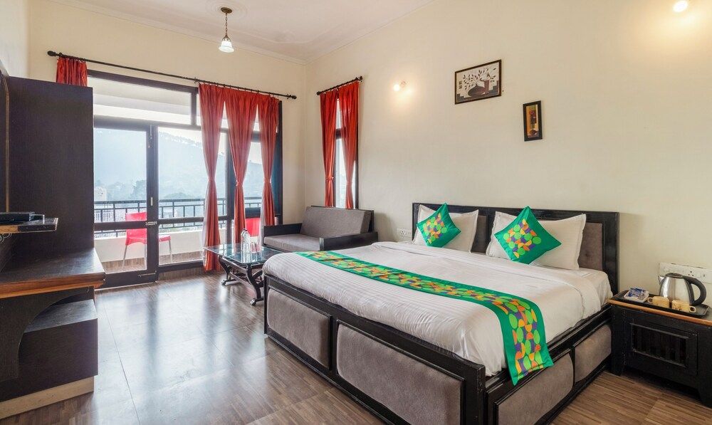 Treebo Spring Birds - Kainchi Dham Standard room with balcony 2