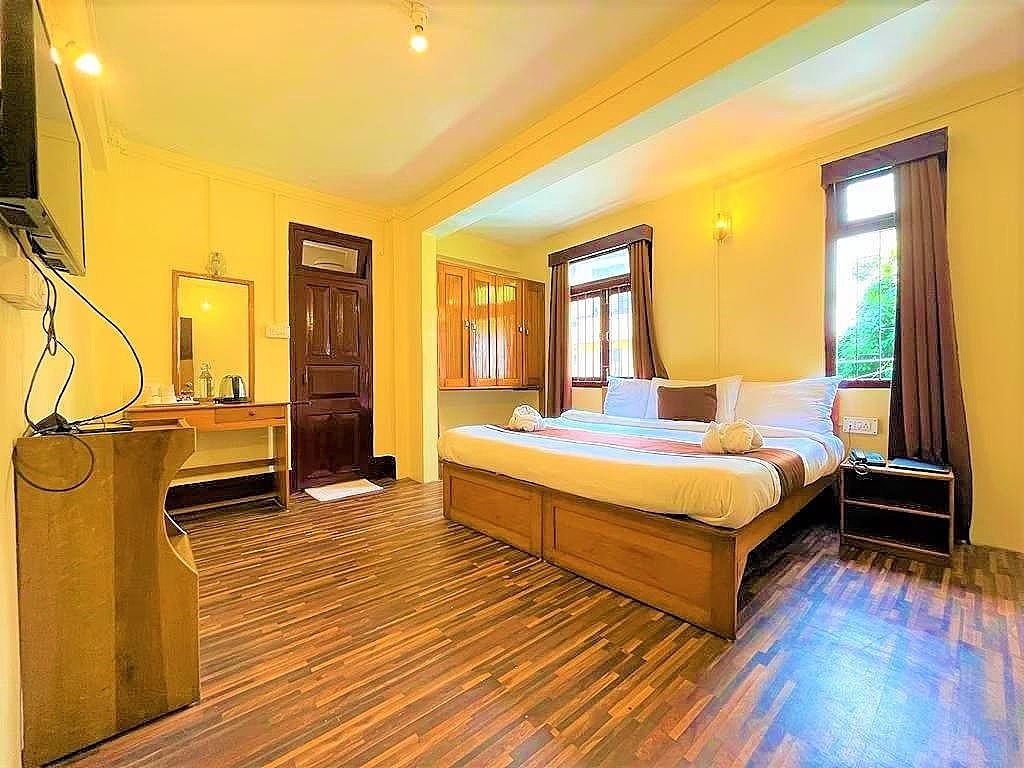 Magpie Mall Road Residency DELUXE ROOM