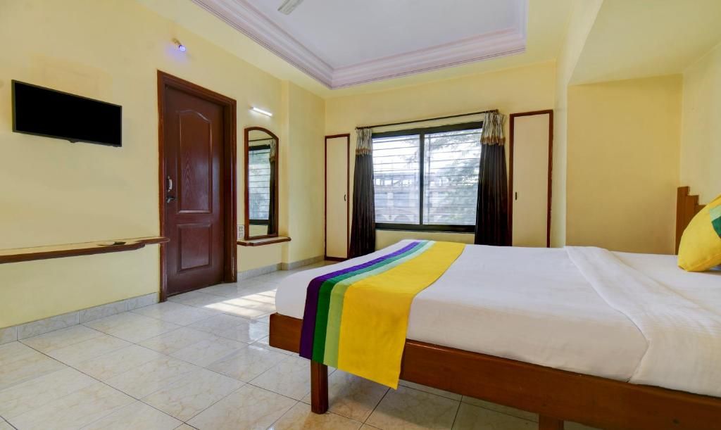 Treebo Trip Kala Laxmi Station Road Deluxe Double Room 18
