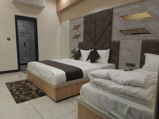 Super Deluxe Triple Bedroom with balcony