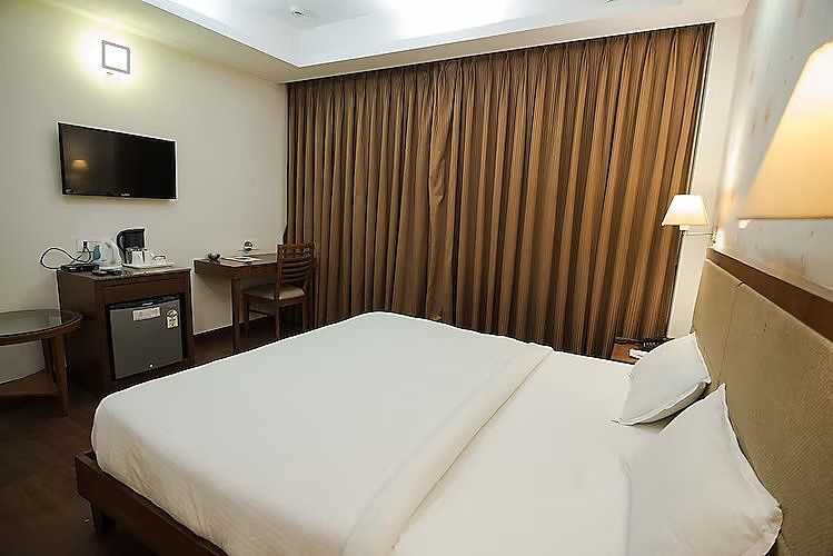 L N Hotels & Resorts AC Deluxe Room with High Speed WIFI 2