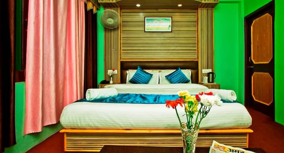 KING BED ROOM WITH ATTACHED BATHROOM