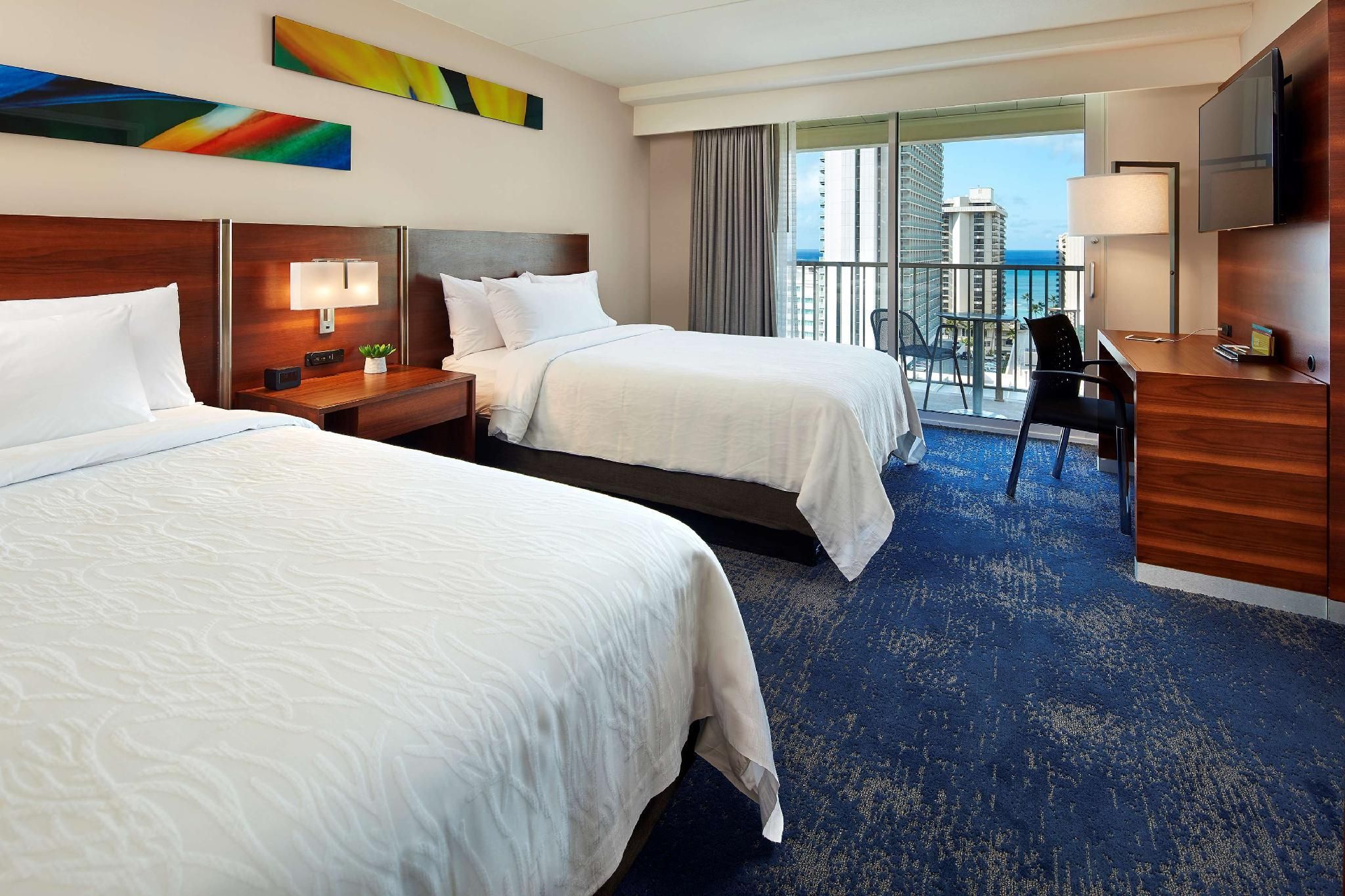 2 DBL BEDS 1 BEDROOM SUITE PARTIAL OCEAN VIEW