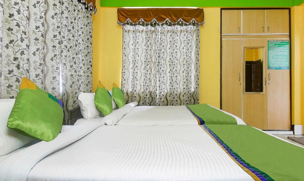 Treebo Trend JKR Residency Dhankheti Mahogany	