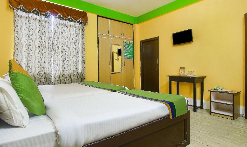 Treebo Trend JKR Residency Dhankheti Mahogany	 2