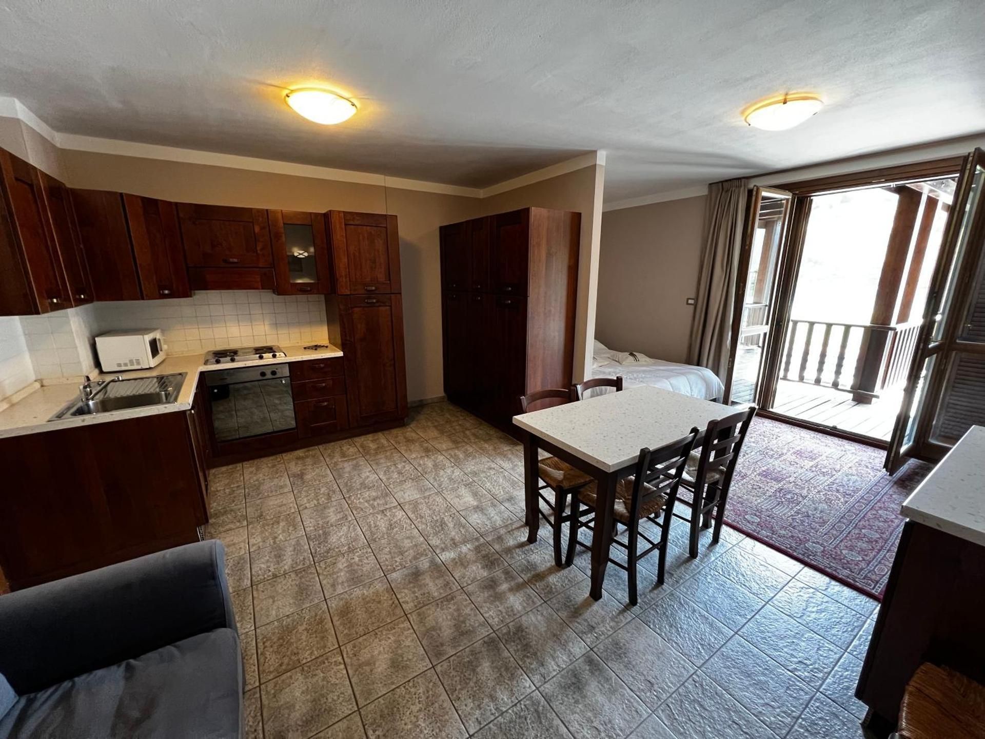 One-Bedroom Apartment with Balcony and Mountain View